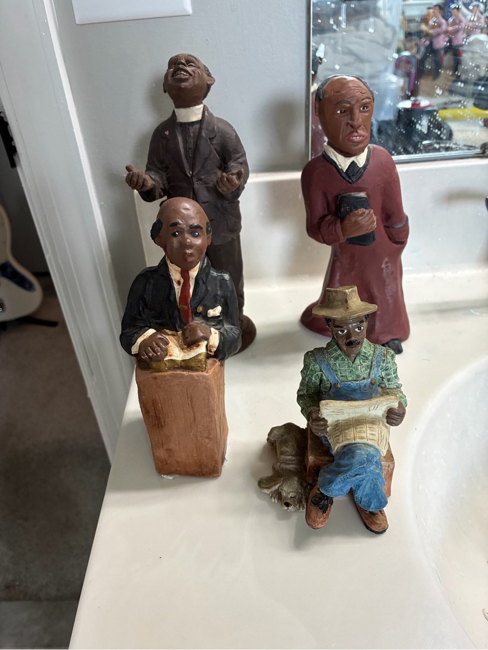These items are vintage African American resin folk art figurines